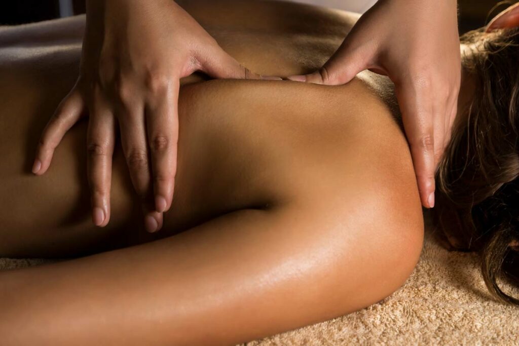 Woman receiving shoulder massage